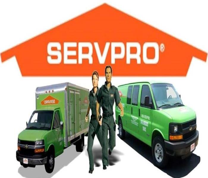 SERVPRO truck and van with man and female responders